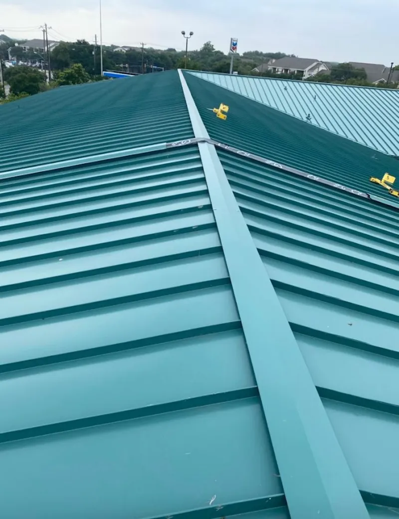 Green commercial metal roof ridge and valley for Metal Roof Repair in Colchester